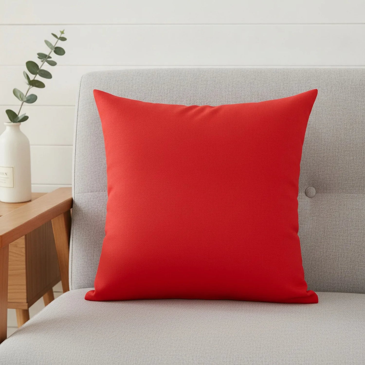 Housse de coussin rouge uni